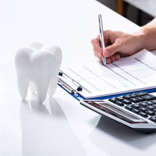 Patient checking dental plan for insurance coverage