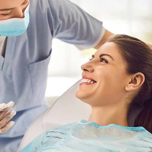 a patient chatting with her dentist