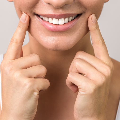 a patient smiling after ICON smooth surface treatment
